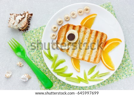 Food art idea - grilled sandwich shaped fish for funny kids breakfast