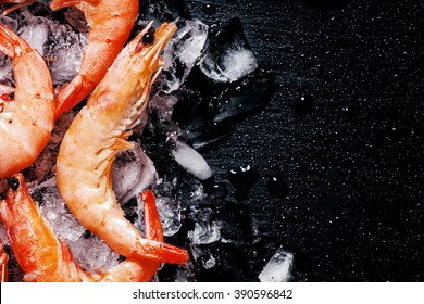 Food Background, Frozen Cooked Shrimp With Ice, Black Background, Top View