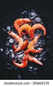 Food Background, Frozen Cooked Shrimp With Ice, Black Background, Top View