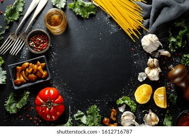 Food Background With Ingredients For Cooking On Dark Table. Italian Kitchen. 