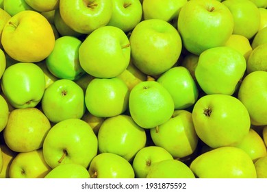 Food Background: Ripe Green Apples In Bulk Freshly Picked Raw New Harvest