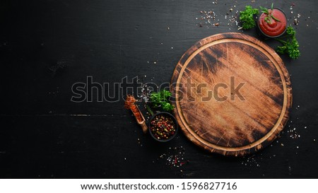 Food background. Spices, herbs and kitchen tools. Top view. free space for your text. Rustic style.