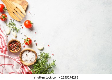 Food background with spices, herbs and utensil on white background. - Shutterstock ID 2255294293