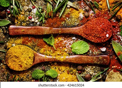 Food background, spices, peppers, salt, herbs, mint leaves, top view - Powered by Shutterstock