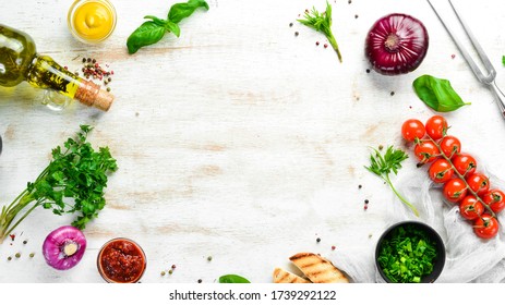 Food background. Vegetables, spices and kitchen utensils on the old table. Free copy space. - Shutterstock ID 1739292122