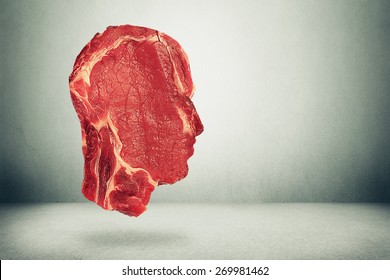 Food Balance Health Related Eating Choices. Red Steak Meat Shaped As Human Head. Nutritional Decisions And Diet Concept 