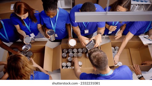 Food Bank Humanitarian Aid In Donation Boxes. Volunteer Community - Powered by Shutterstock