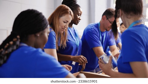 Food Bank Humanitarian Aid In Donation Boxes. Volunteer Community - Powered by Shutterstock