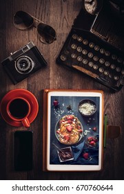 Food Blog Concept With Pancakes On Tablet Pc On Wooden Desk