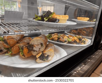 Food in a cabinet in a cafe - Powered by Shutterstock