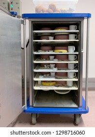 A Food Cart In A Hospital Filled With Food For Patient Care. Concept: Health And Diet