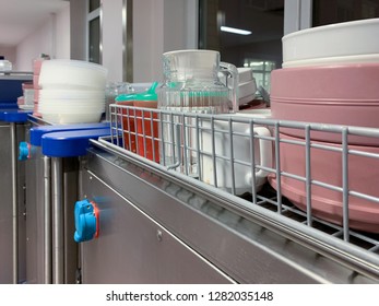 Food Cart In Modern Hospital Is Standing On The Dishes. Concept: Health