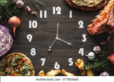 Food Clock On The Black Wood Laminate, Concept Time To Eat.