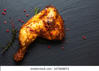 Food Concept Organic Roasted Or Grilled Chicken Leg Quarters On Black Slate Stone Plate