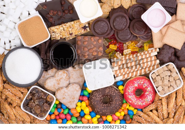 Food containing sugar. Too much\
sugar in diet causes obesity, diabetes and other health\
problems