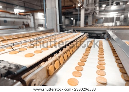 Food cookies industry banner, biscuit production in modern factory on conveyor belt.