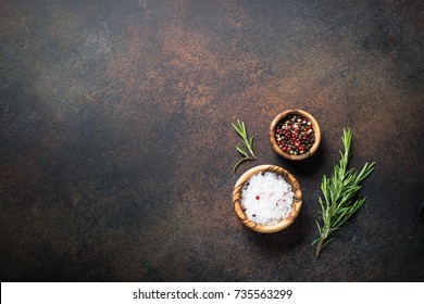 Food Cooking Background With  Spices And Herbs On Dark Stone Table. Top View With Copy Space.