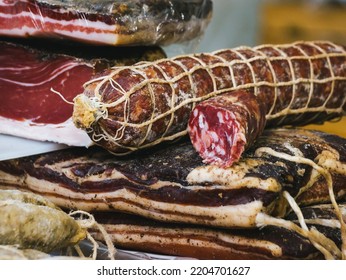 food counter, selling Italian cured meats. Italian salami close up