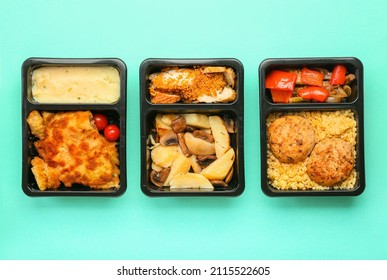 Food delivery containers with meals on color background - Shutterstock ID 2115522605