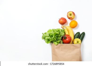 Food Delivery. Craft Bag With Vegetables And Fruits On A White Background. Online Order From The Grocery Store