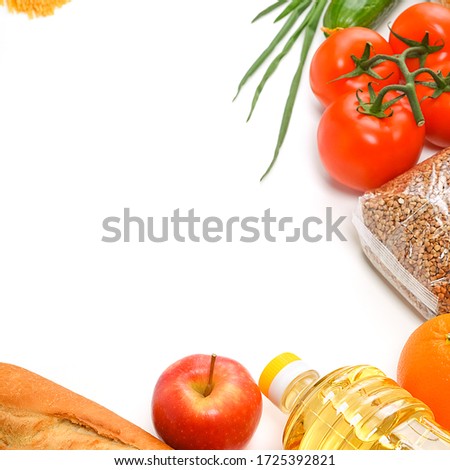 Food delivery, donation, food supply, copyspace. On a white background, buckwheat, pasta, sugar, peas, canned food, tomatoes, cucumber, bread, orange, apple, eggs, ginger, package.