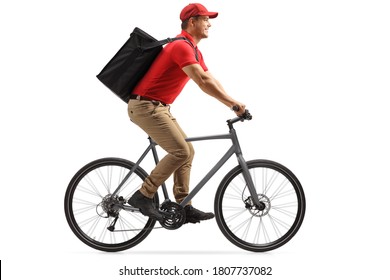 Food delivery guy in a red t-shirt delivering food with a bicycle isolated on white background