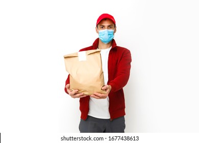 Food Delivery Man Wearing Medical Mask. Corona Virus Concept