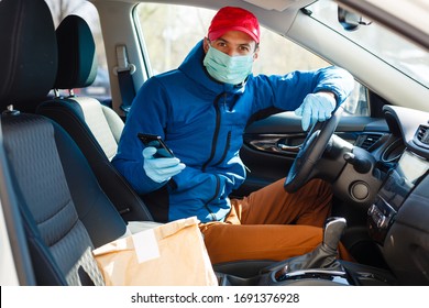 Food Delivery Man Wearing Medical Mask. Corona Virus Concept