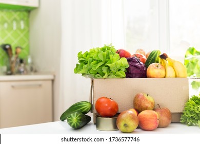 Food Delivery. Paper Box With Vegetables And Fruits In Kitchen. Online Order From The Grocery Store