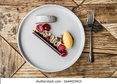 food dessert close up plate white restaurant sweet gourmet elegant rich small top view table dish 