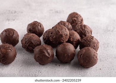 food, dessert - sweet food, truffle, candy, group, chocolate, sweet, ball, homemade, cocoa, confectionery, round, eat, horizontal, calorie, sugar - food, truffle chocolate - Powered by Shutterstock