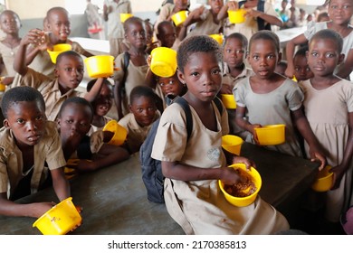 Food Distribution In An African Primary School. Lome. Togo.  05-30-2019