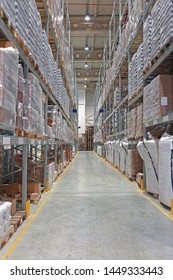 Food Distribution Warehouse Row With Bulk Sacks In Shelves