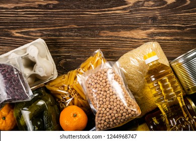 Food Donations In Box In Kitchen Background, Copy Space