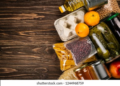 Food Donations In Box In Kitchen Background, Copy Space