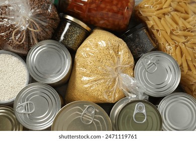 Food donations on wooden background