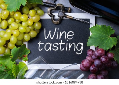 Food And Drink, Harvest Autumn Fall Concept. Wine Tasting, Degustation, Invitation Card With Symbols - Grape Vine, Bottle, Glasses, Corkscrew On A Black Background