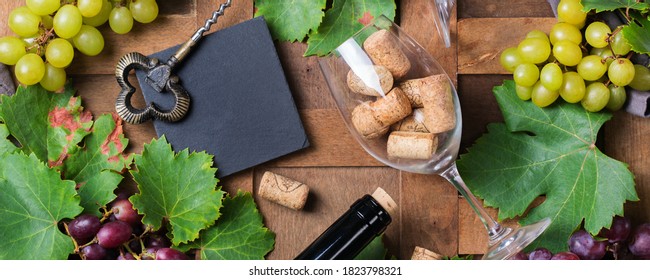 Food And Drink, Harvest Autumn Fall Concept. Wine Tasting, Degustation, Invitation Card With Symbols - Grape Vine, Bottle, Glasses, Corkscrew. Wooden Background, Banner