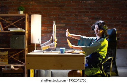 Food, Drinks, Cuisine. Young Caucasian Woman During Online Cooking Lesson Through Laptop At Home. Virtual Reality. Concept Of Remote Safe Entertaiments, Meetings During Quarantine. Copy Space For Ad.