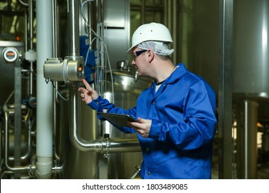 Food Factory Worker In A Production Workshop