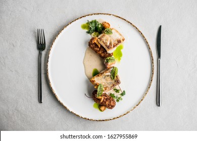 food fish dish elegant chef lunch fillet eat black background plate table gourmet elegant exclusive salmon modern sauce