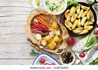 Food Grilled Vegetables Outdoor Table Family Dinner Potato Wedges Roasted Corn Party Picnic. Overhead View, Copy Space