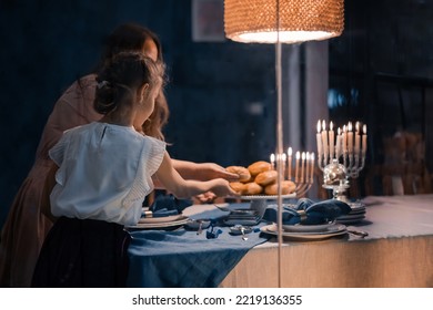 Food For Hanukkah Celebration: Menorah Candles On Wooden Table, Sufganiyot Cake And Table Setting, Jewish Symbol Centerpieces, White And Blue. Holiday Israel Hebrew Traditional Family Celebration