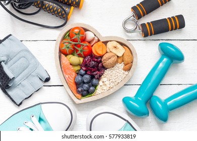 Food In Heart And Dumbbells Fitness Abstract Healthy Lifestyle Concept