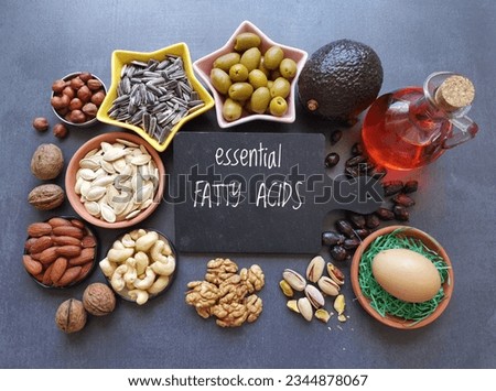 Food high in linoleic acid. Natural food sources of omega 6 and omega 3 essential fatty acids. Good fats - nuts, seeds, oils, vegetable; concept of healthy and balanced diet.
