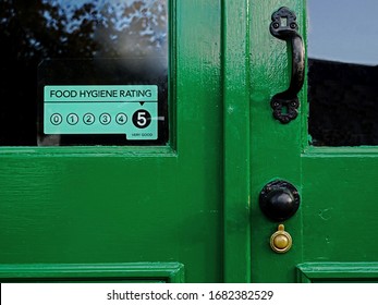 Food Hygiene Rating 5, Faded Sticker On Old Green Door