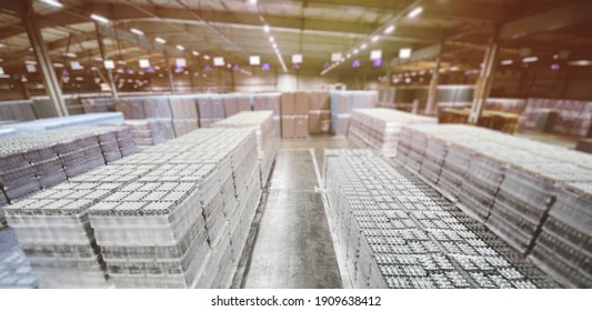 Food Industrial Warehouse For Storage And Storage Of Tetrapacks With Drinks, Water, Beer In Plastic PET Bottles.