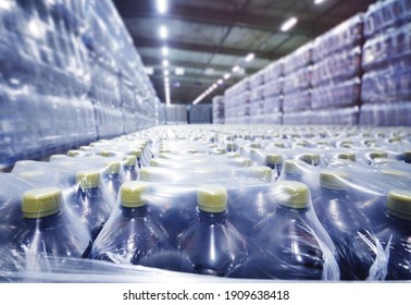 Food Industrial Warehouse For Storage And Storage Of Tetrapacks With Drinks, Water, Beer In Plastic PET Bottles.