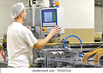 Food Industry - Biscuit Production In A Factory On A Conveyor Belt 