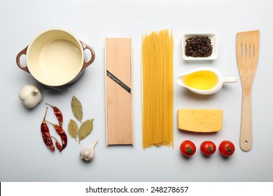 Food Ingredients And Kitchen Utensils For Cooking Isolated On White